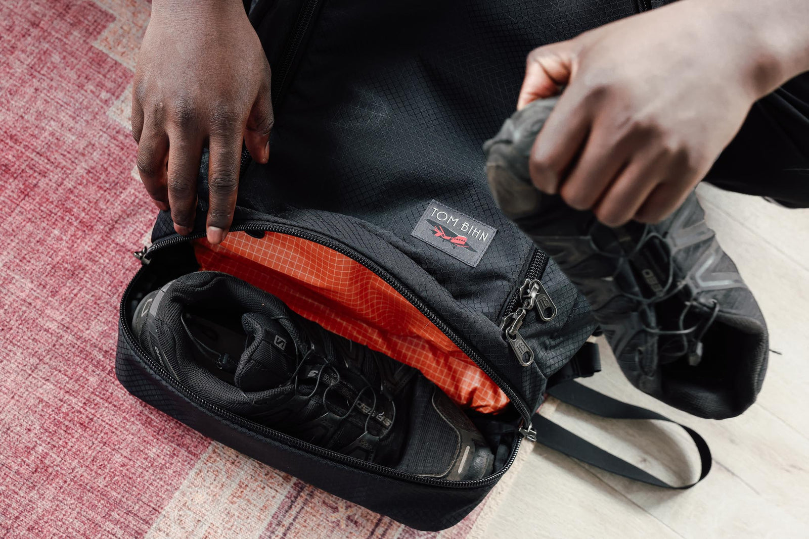visible lifestyle^^A person packing shoes in a Spectron Techonaut 45