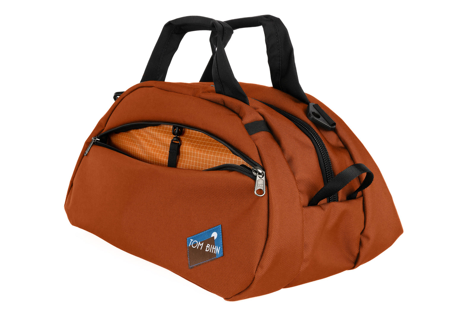 visible variant TB0435-TKZD^^The Old School Carry All in Burnt Orange 630 Ballistic with Zest (orange with a white grid) 200 Halcyon interior.