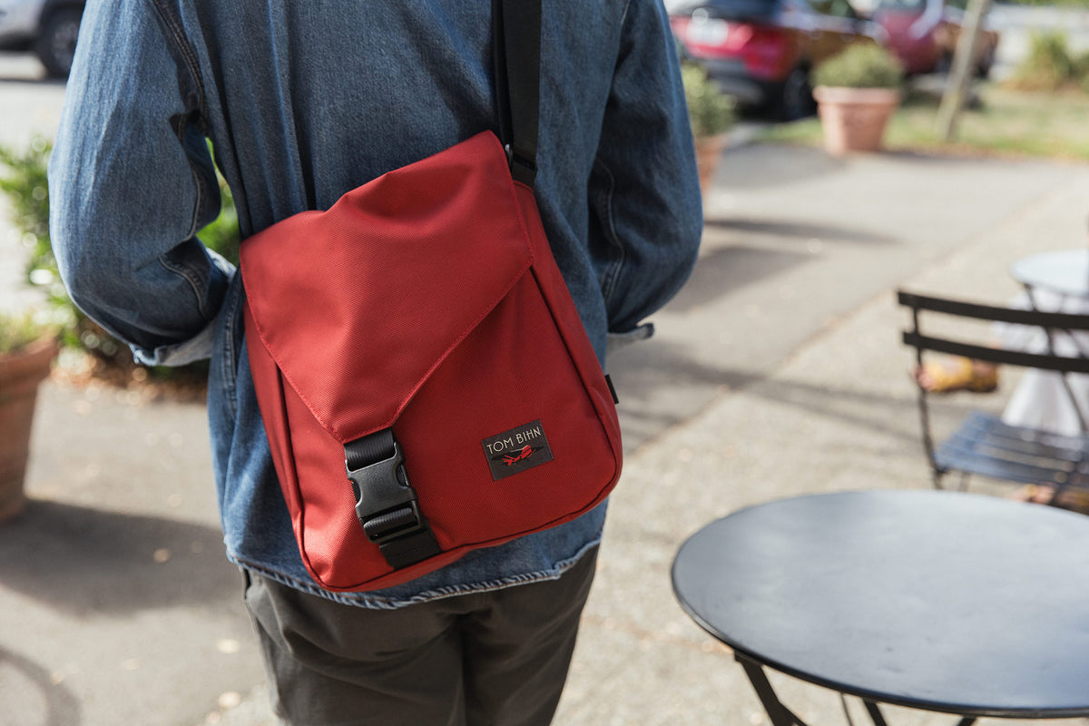visible lifestyle^^A person wearing a Medium Cafe Bag at a cafe