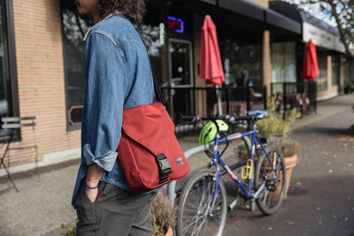 visible lifestyle^^A person wearing a Medium Cafe Bag