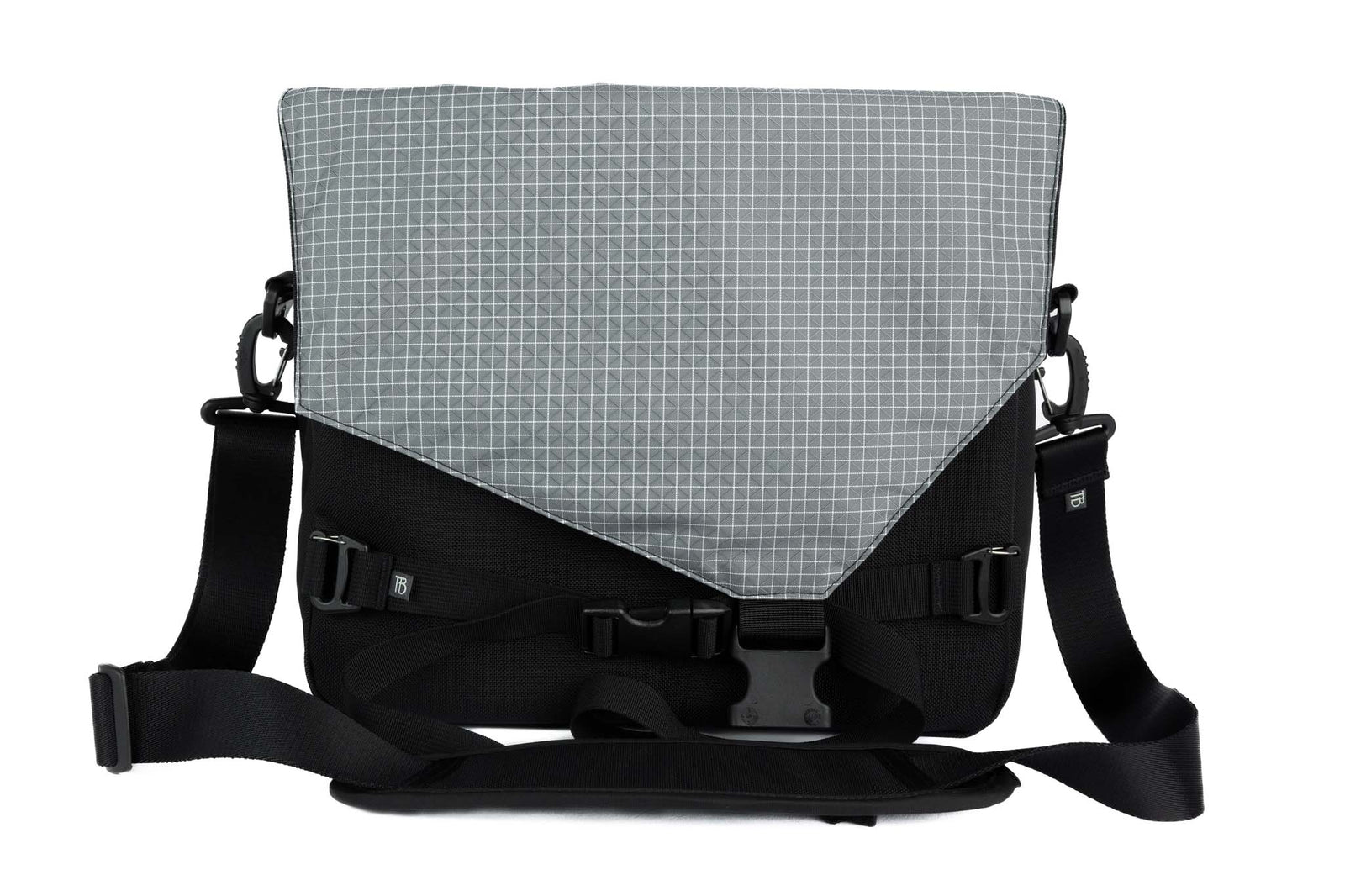 visible variant TB0204-BKND^^The Maker's Bag in Black 525 Ballistic with a Northwest Sky (light grey with white grid) 200 Halcyon interior.
