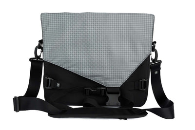 visible variant TB0204-BKND^^The Maker's Bag in Black 525 Ballistic with a Northwest Sky (light grey with white grid) 200 Halcyon interior.