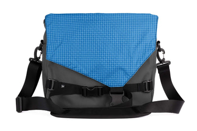 visible variant TB0204-GKLD^^The Maker's Bag in Nebulous Grey (Medium grey )525 Ballistic with an Island (blue with white grid) 200 Halcyon interior.