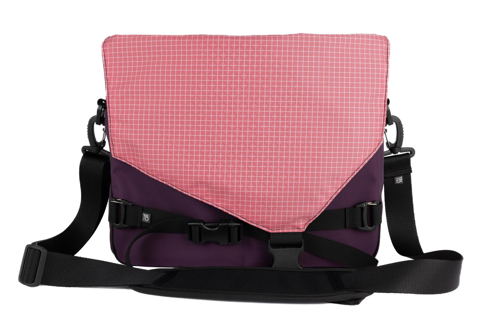 visible variant TB0204-UK4D^^The Maker's Bag in Aubergine (dark purple) Ballistic with a Sakura (pale pink with white grid) 200 Halcyon interior.