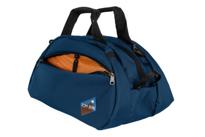 visible variant TB0435-DKZD^^The Old School Carry All in Deep Blue 630 Ballistic with Zest (orange with white grid) 200 Halcyon interior.