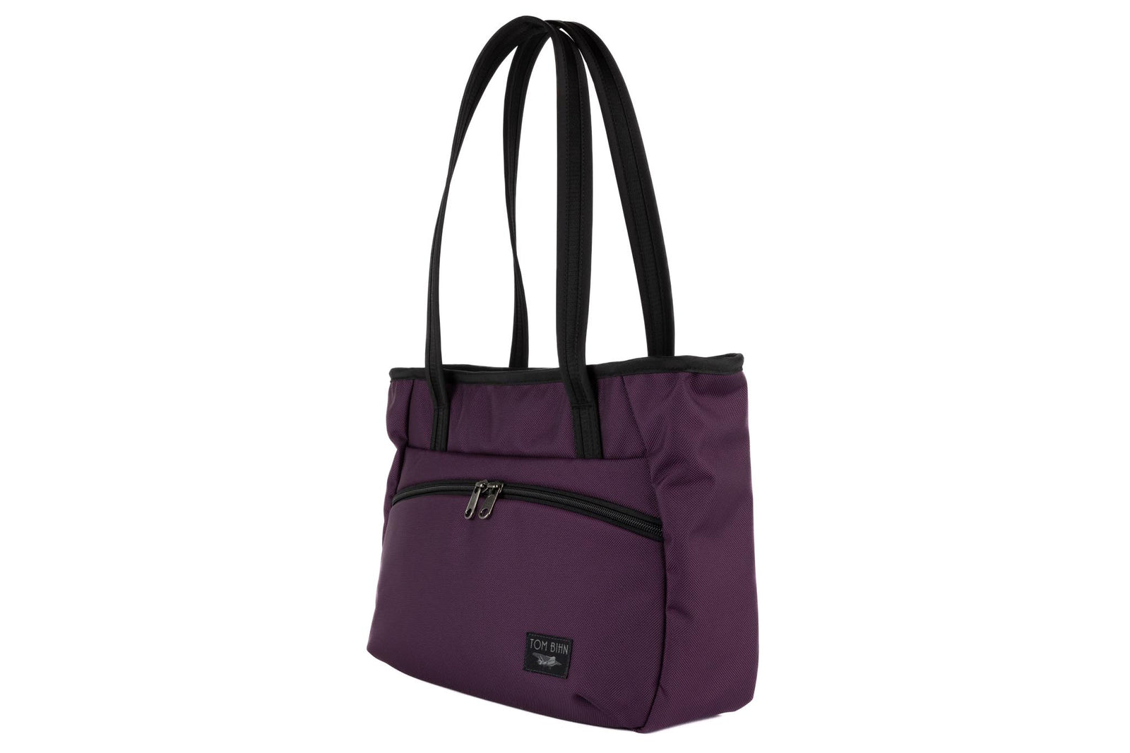 visible variant TB0715-UKYD^^Photo of the Nomad Tote in Aubergine Ballistic.