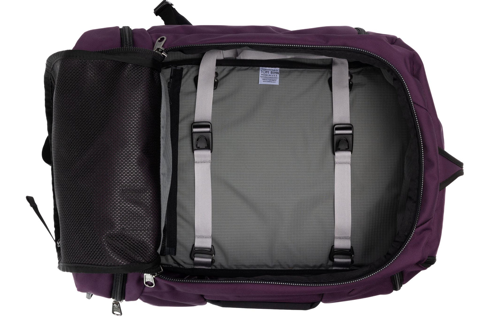 visible variant TB0903-UKGL^^ An open Techonaut 45 with an Aubergine (red-ish purple) exterior and a Mountain Grey (grey with light grey grid) interior.