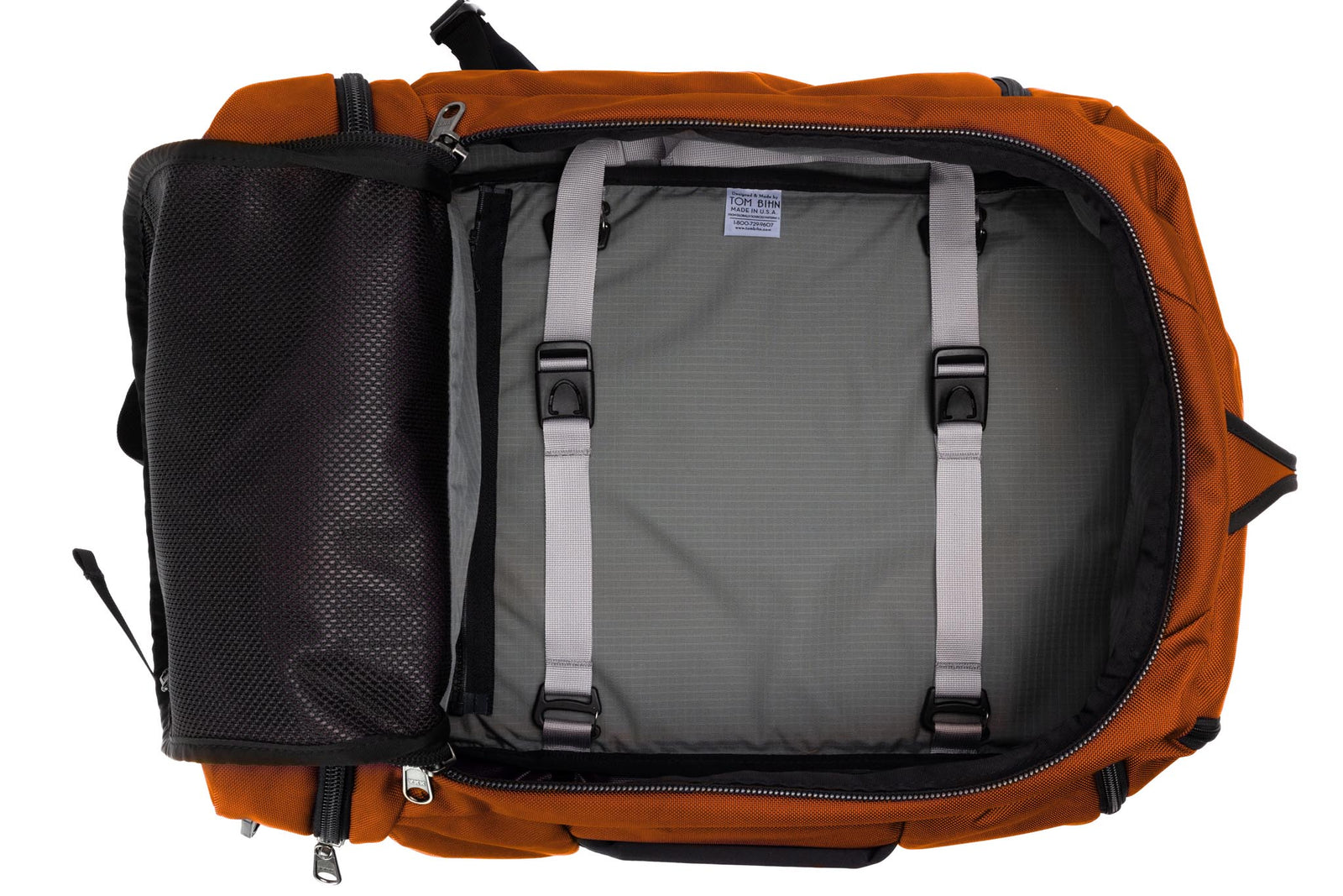 visible variant TB0903-TKGL^^ An open Techonaut 45 with a Burnt Orange exterior and a Mountain (grey) interior.