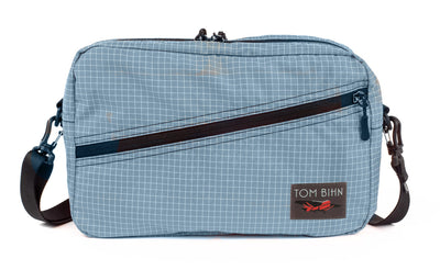 visible variant TB0921-7D^^A Packing Cube Shoulder Bag in Tidal (light bluish-grey with white grid) 200 Halcyon with a 1-inch shoulder strap attached