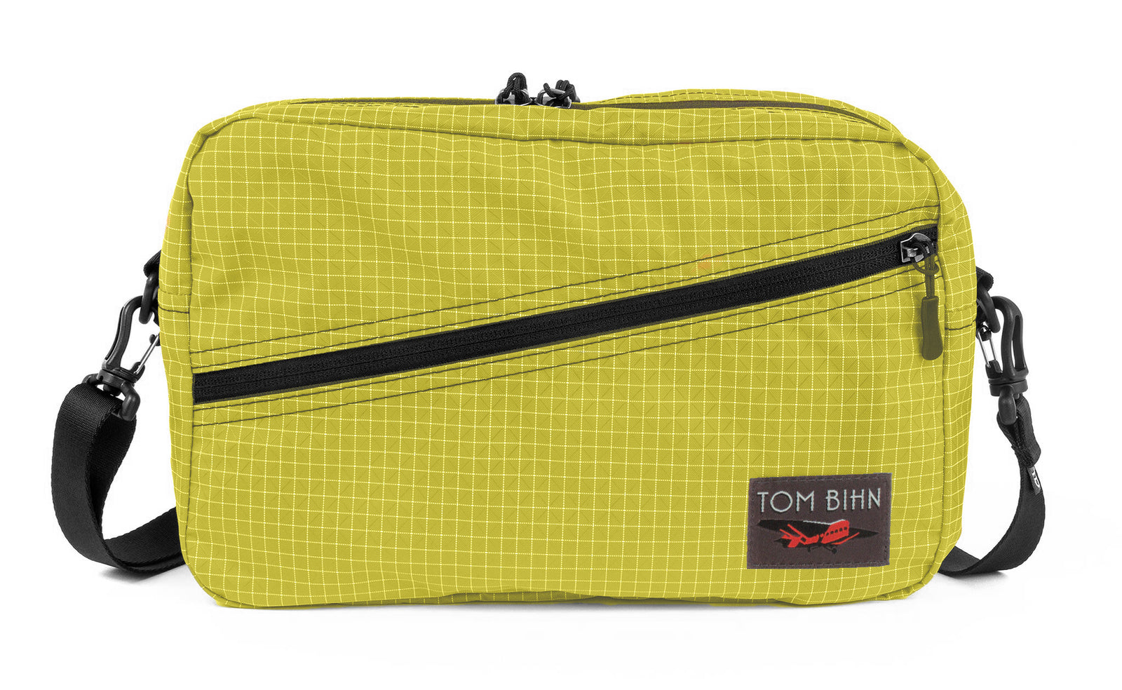 visible variant TB0921-WD^^A Packing Cube Shoulder Bag in Wasabi (green with white grid) 200 Halcyon with a shoulder strap.