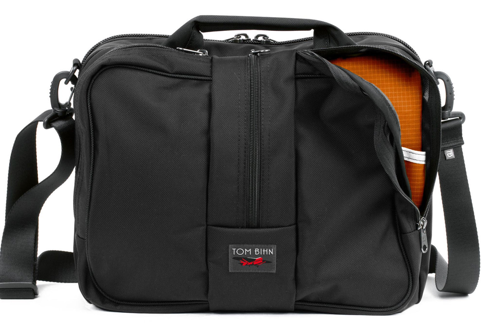 visible variant TB0968-BKPL^^Pilot in Black Ballistic with Persimmon (orange with light orange grid) 210 Cerylon interior.