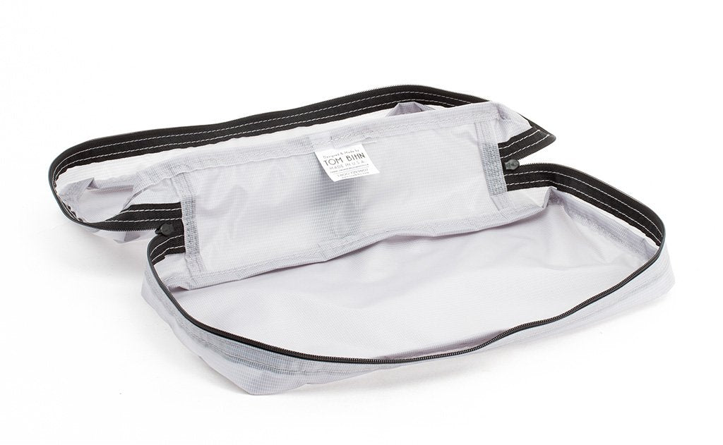 visible variant TB90502-NE^^An empty and open Northwest Sky (light grey) Aether End Pocket Aeronaut 30 Packing Cube.