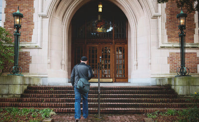 ^^A person walking with a full Maker's Bag.