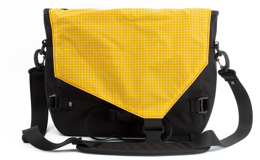 visible variant TB0204-BKOD^^The Maker's Bag in Black 525 Ballistic with a Solaris (yellow with white grid) 200 Halcyon interior.