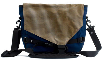 visible variant TB0204-DKCD^^The Maker's Bag in Deep Blue (dark blue) 525 Ballistic with a Coyote (brown with white grid) 200 Halcyon interior.
