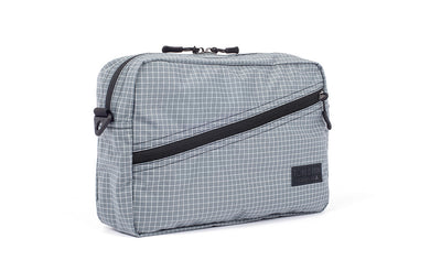 detail visible^^A 3/4 shot of the Packing Cube Shoulder Bag.