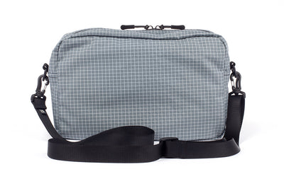 detail visible^^A reverse shot of the Packing Cube Shoulder Bag with a 1" shoulder strap attached