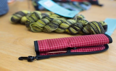 lifestyle visible^^a Pen Tool Wrap rolled up and snapped shut.