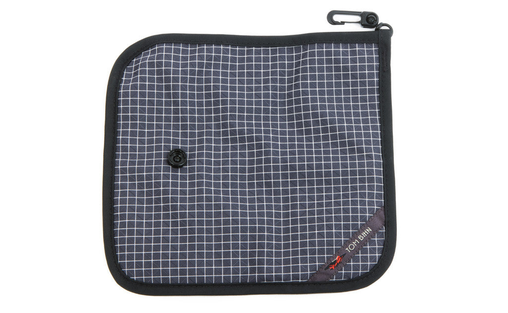 visible variant TB1235-SD^^The back of a Tool Pen Wrap in Steel (dark-grey with white grid) 200 Halcyon.