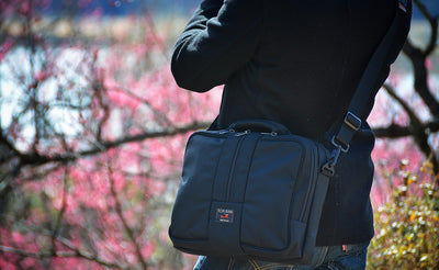 lifestyle visible^^A person holding a Pilot.