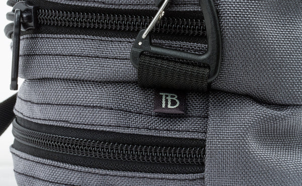 A close shot of the triagle metal clip on a Snake Charmer.