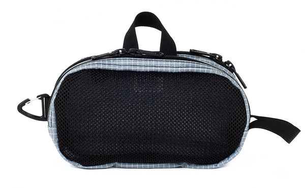 The Small Snake Charmer in Tidal (light blue-grey with white grid) 200 Halcyon.