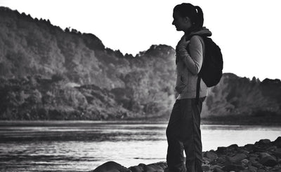 A person at a river with the Synapse 19.