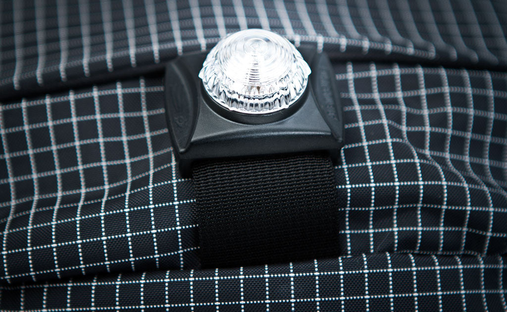 A Guardian Light attached to the light strap of the Synapse 25.