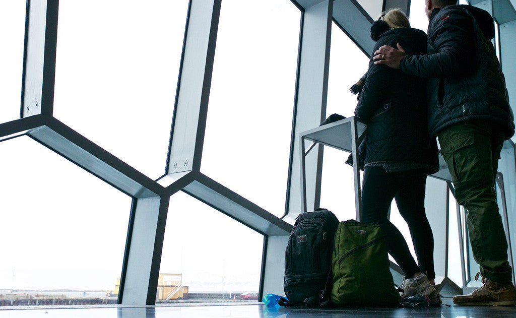 People at an airport with a Synapse 25.