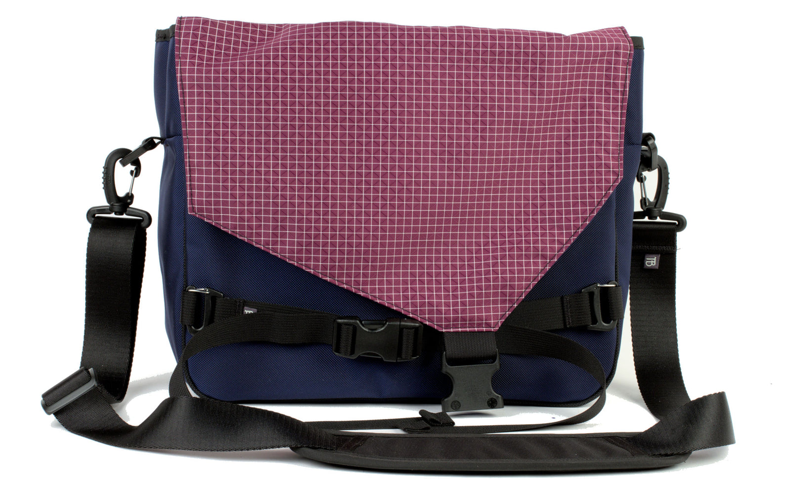 visible variant TB0204-DK5D^^The Maker's Bag in Deep Blue (dark blue) 525 Ballistic with Acai (dark purple with white grid) 200 Halcyon interior.