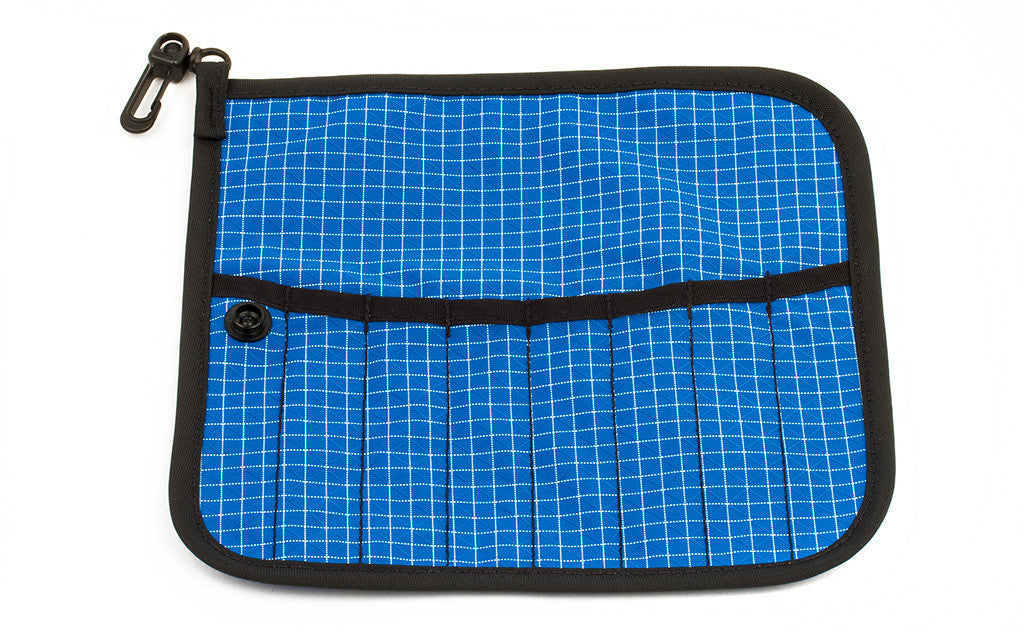 visible variant TB1235-ID^^The front of a Tool Pen Wrap in Island (blue with white grid) 200 Halcyon.