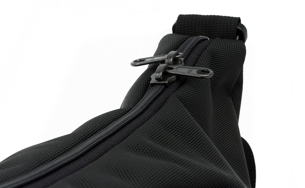 detail visible^^Close shot of the main compartment's zipper.