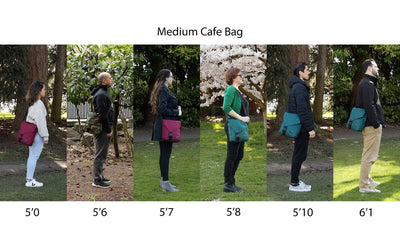 People standing side-by-side wearing the Medium Cafe Bag.