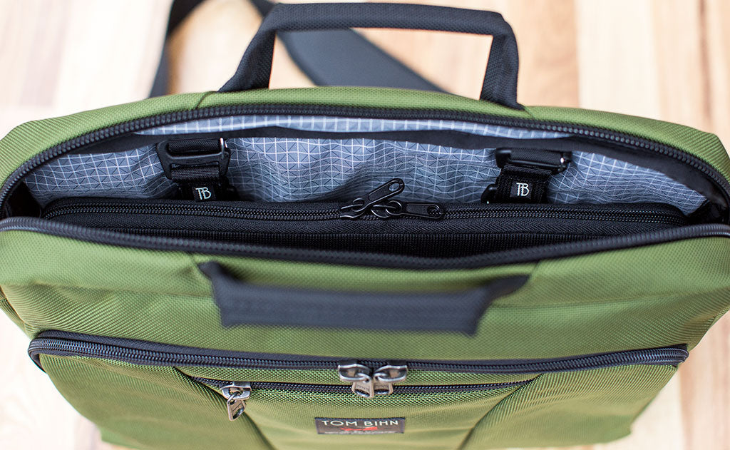 detail visible^^A Cache attached to a Cadet using the included rail clips.