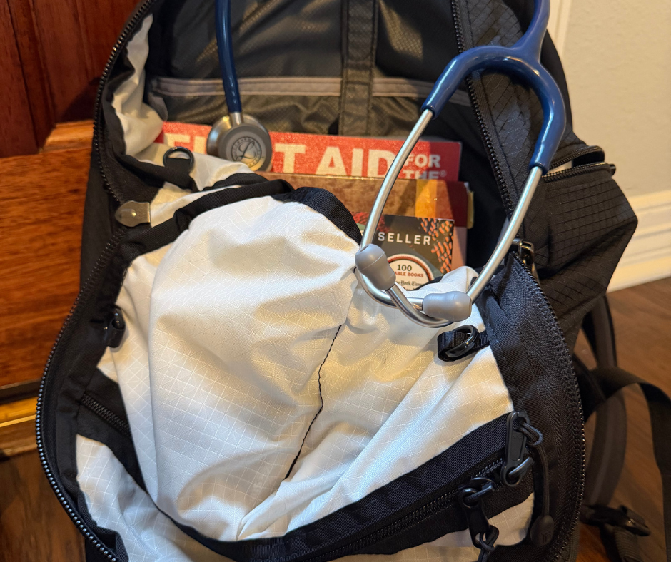 Smart Alec 2.0 packed with medical supplies and textbooks.