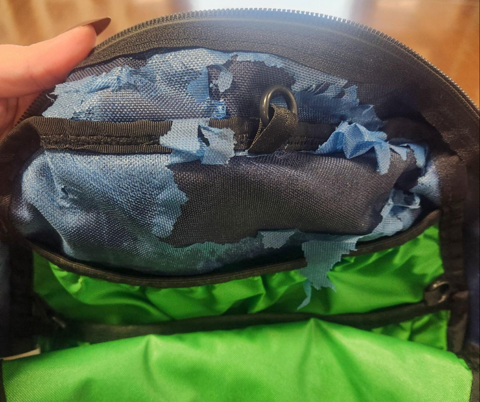 Close-up photo of the interior of Shelby's Daylight Backpack experiencing delamination.