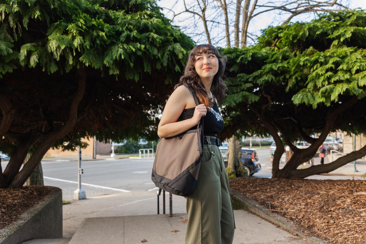 Person wearing the Swift on their shoulder.