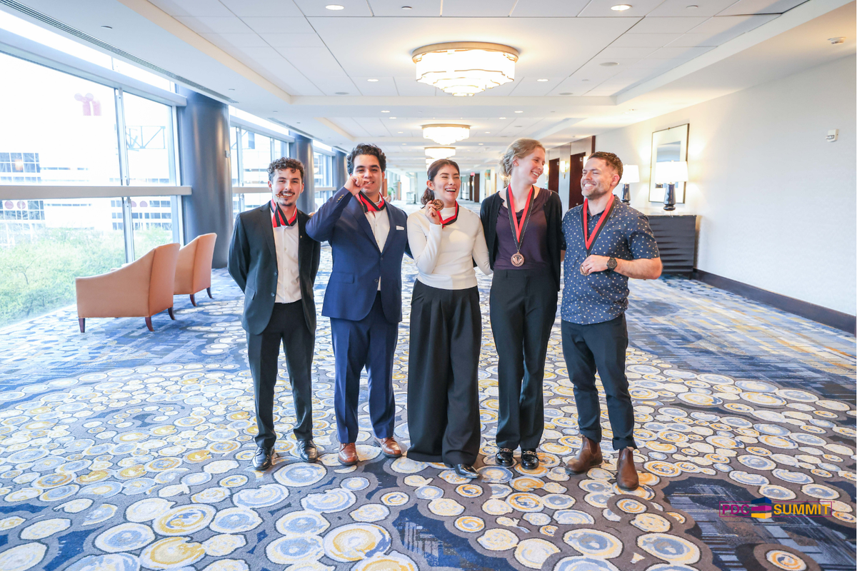 The Team with their medals at the PDC Summit, in Houston, TX.