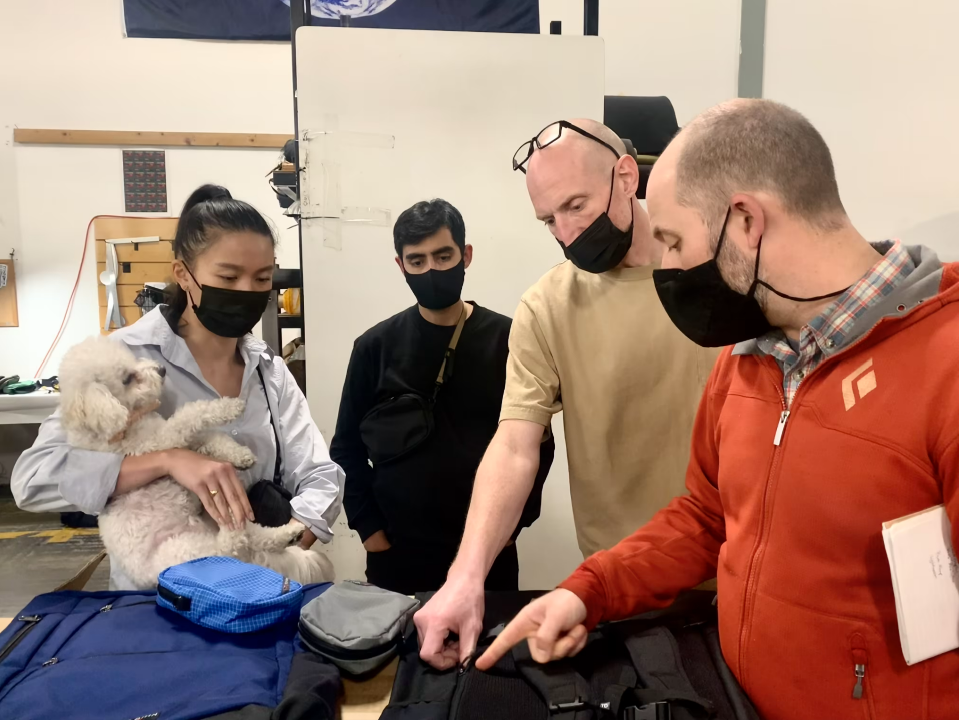 Mike, Ben, Jose, and Cindy (and Daikon) discuss the Addax 31 during a PPB meeting