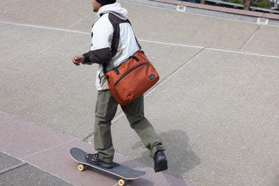visible lifestyle^^A person skateboarding with the Nomad 16