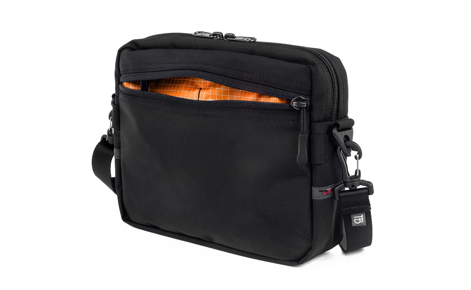 visible variant TB0414-BKZD^^The Side Kick in Black Ballistic with an Zest (orange with white grid) 200 Halcyon interior.