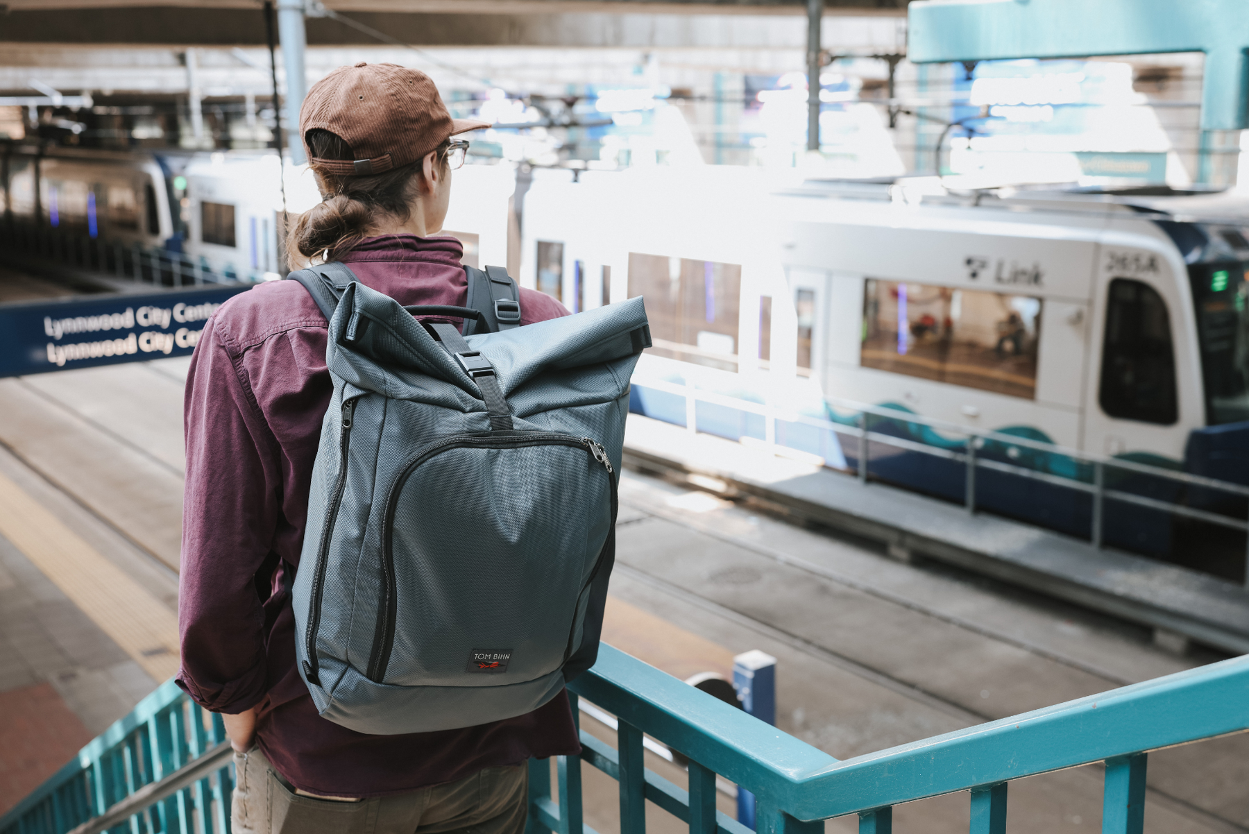 Person wearing Adept Roll-Top Backpack