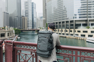 visible lifestyle^^Person wearing the Aeronaut 30 as a backpack overlooking a canal.