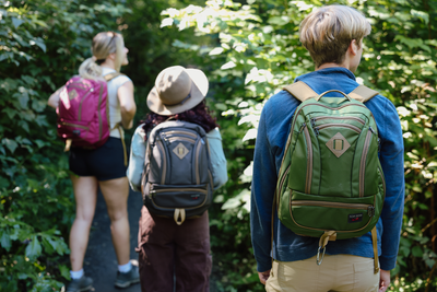 visible lifestyle^^Guide's Edition Synik 26 Saguaro person hiking through trees