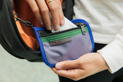 visible lifestyle^^A Mystery Pouch with lotion tube in it. 