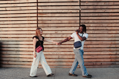 lifestyle visible^^Two people holding hands wearing Side Effect and Side Kick.