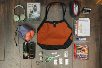 visible lifestyle^^A Swift with crafting items laid out around it.