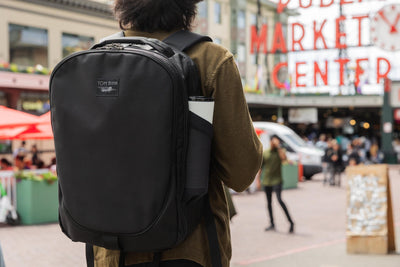 visible lifestyle^^A person carrying a Bixi at Pike Place Market