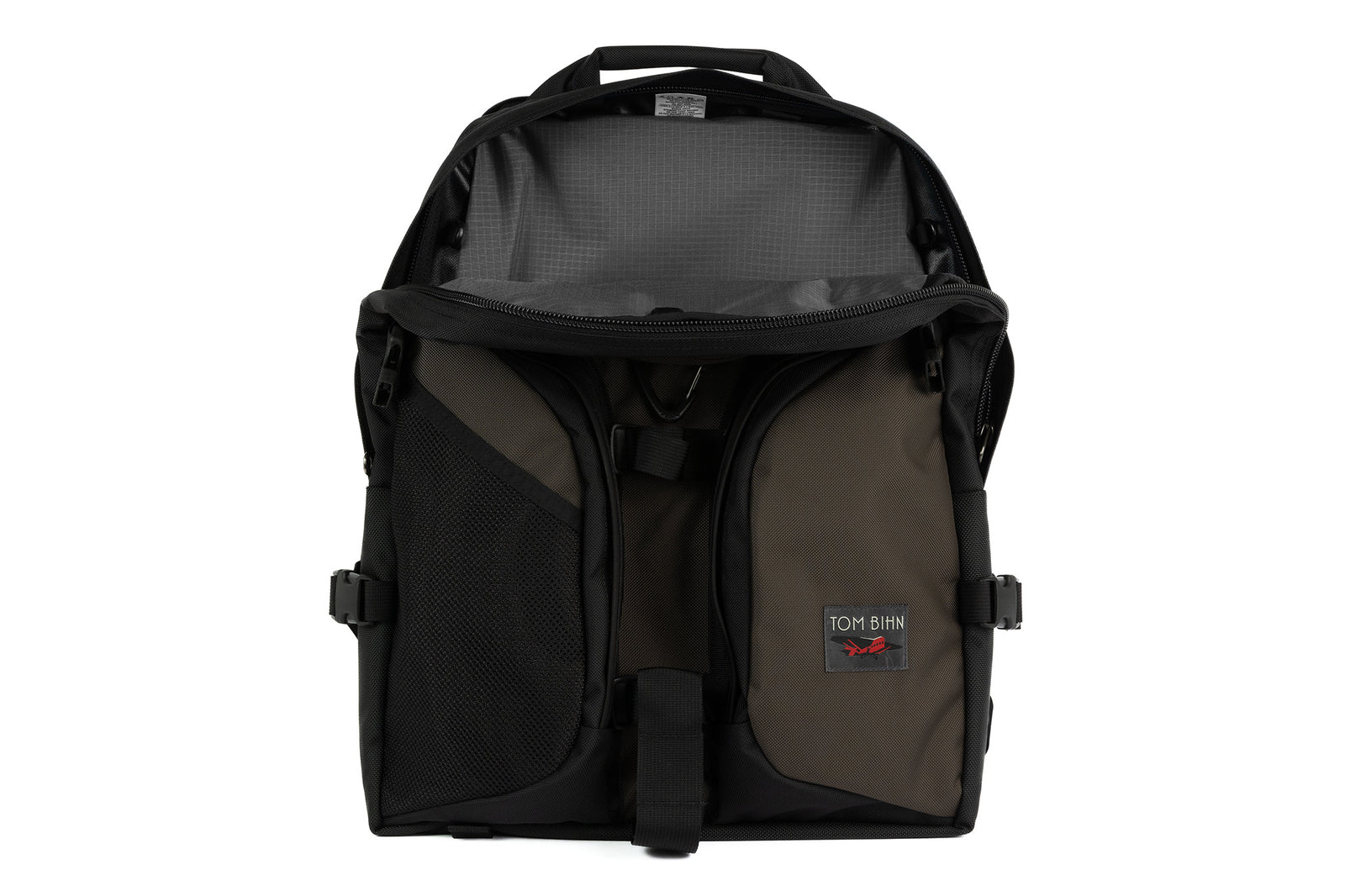visible variant TB0114-RKGL^^The Brain Bag in Ursa (brown-grey) Ballistic with the front main compartment zipper opened to reveal its Mountain (grey with light grey grid) 210 Cerylon interior.