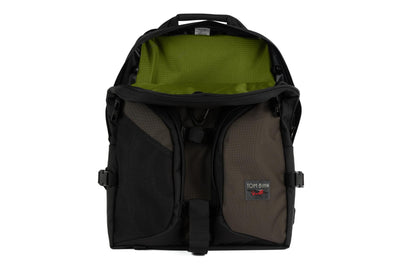 visible variant TB0114-RKML^^The Brain Bag in Ursa (brown-grey) Ballistic with the front main compartment zipper opened to reveal its Moss (dark green with green grid) 210 Cerylon interior.